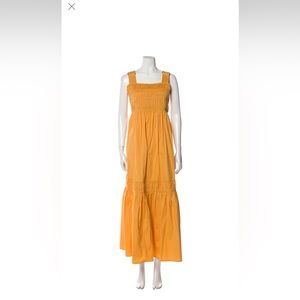 Lee Mathews A-Line Dress
Orange
Pleated Accents
Sleeveless with Square Neckline